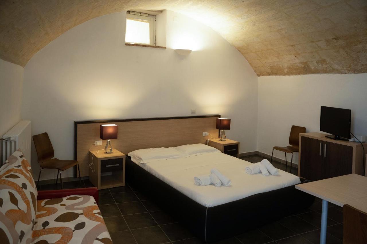 Residence Le Vie Del Mosto Matera Bagian luar foto